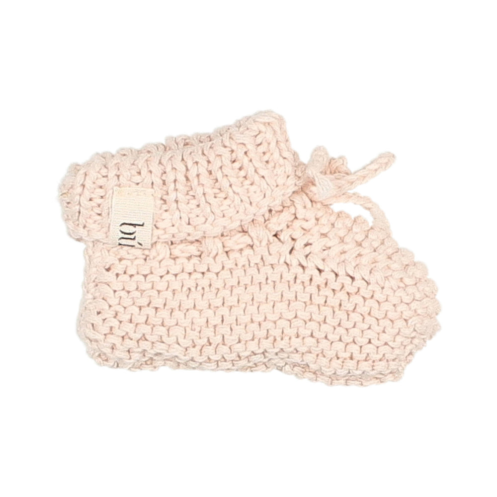 Chaussons en maille rose de chez Buho