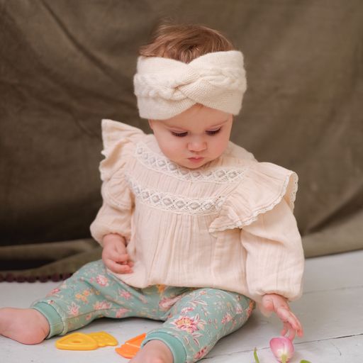 Photo de la blouse Janipa bébé à dentelle blush de Louise Misha